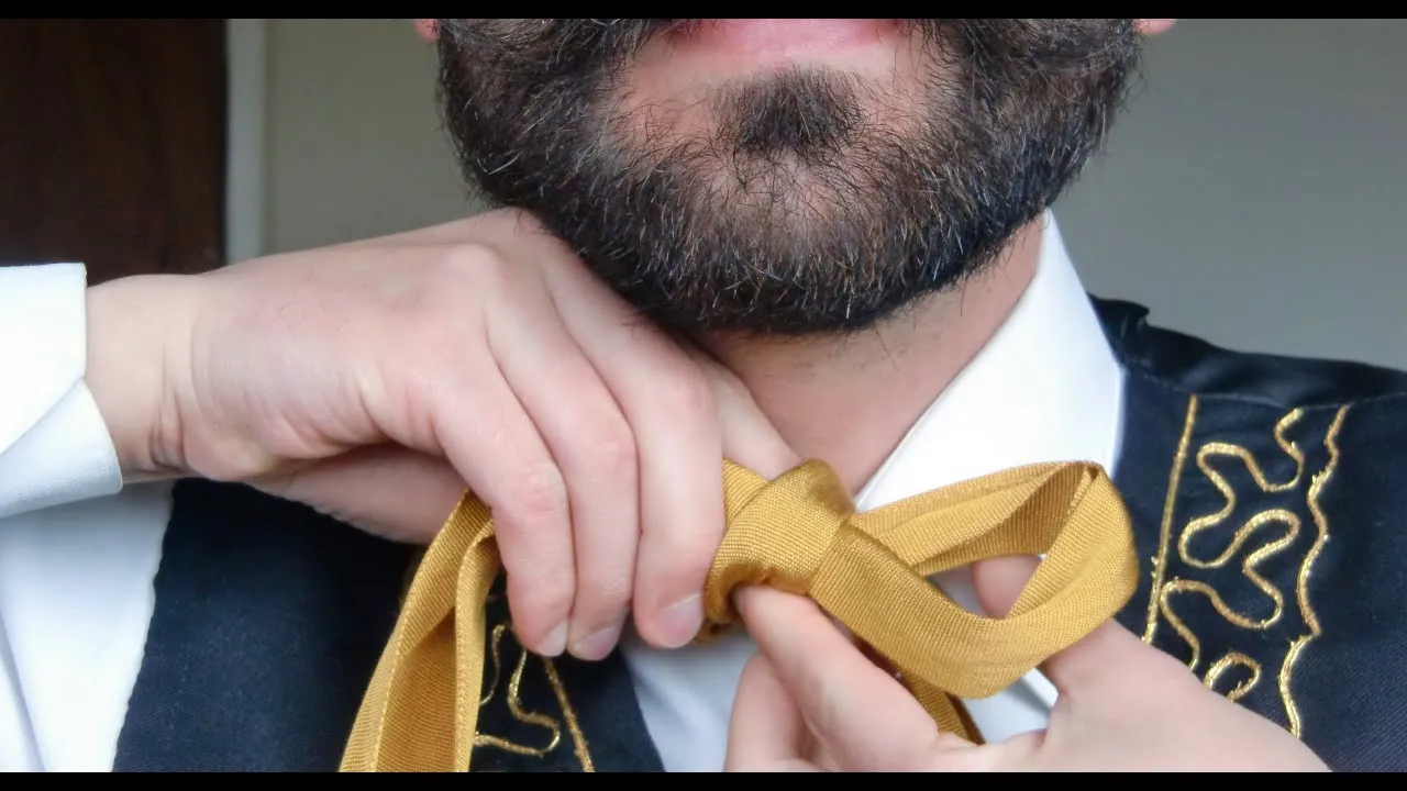 Como atar un moño charro (corbata charra) - YouTube