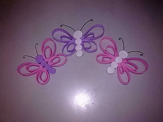 Como hacer mariposas de gomaeva - Imagui