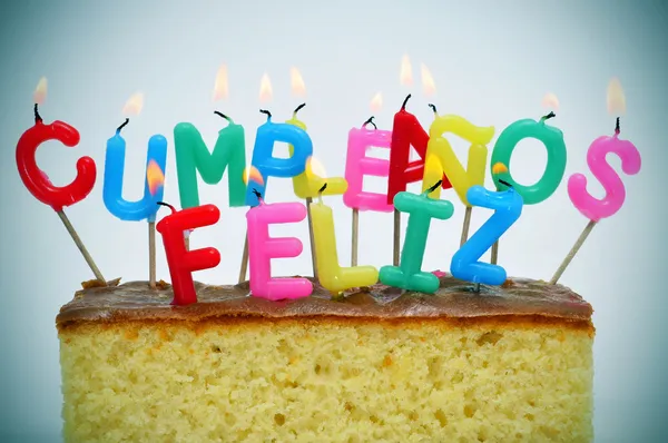 Cumpleanos feliz, happy birthday written in spanish | Stock Photo ...