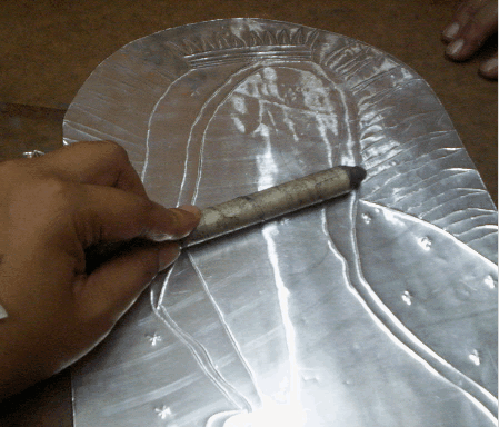  ... de trabajos artisticos con la tecnica del repujado en aluminio