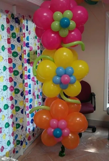 Flores hechas con globos en fiesta infantil. | Lluvia de Ideas ...