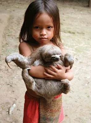 Las Fotos Mas Alucinantes: niña y su mascota.