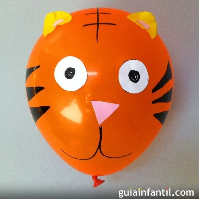 Globo con forma de tigre - 8 ideas para decorar globos con los niños