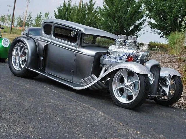 Great looking hot rod. I like the big back wheels and that running ...