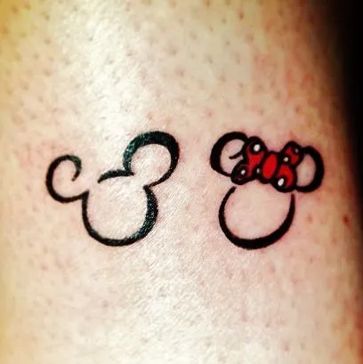 Minnie & mickey mouse disney tattoo... yep. Me and Gene got these ...