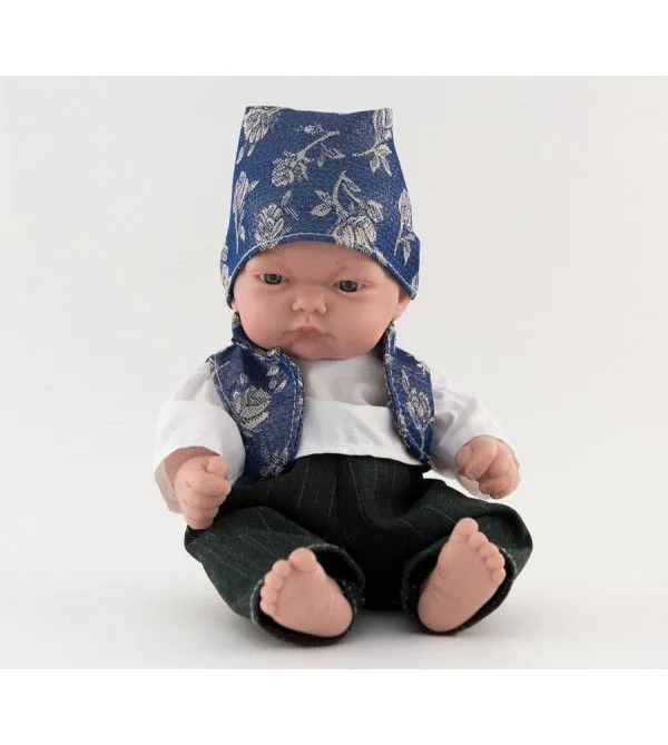 Muñeco bebé vestido con traje regional. Traje con chaleco azul ...