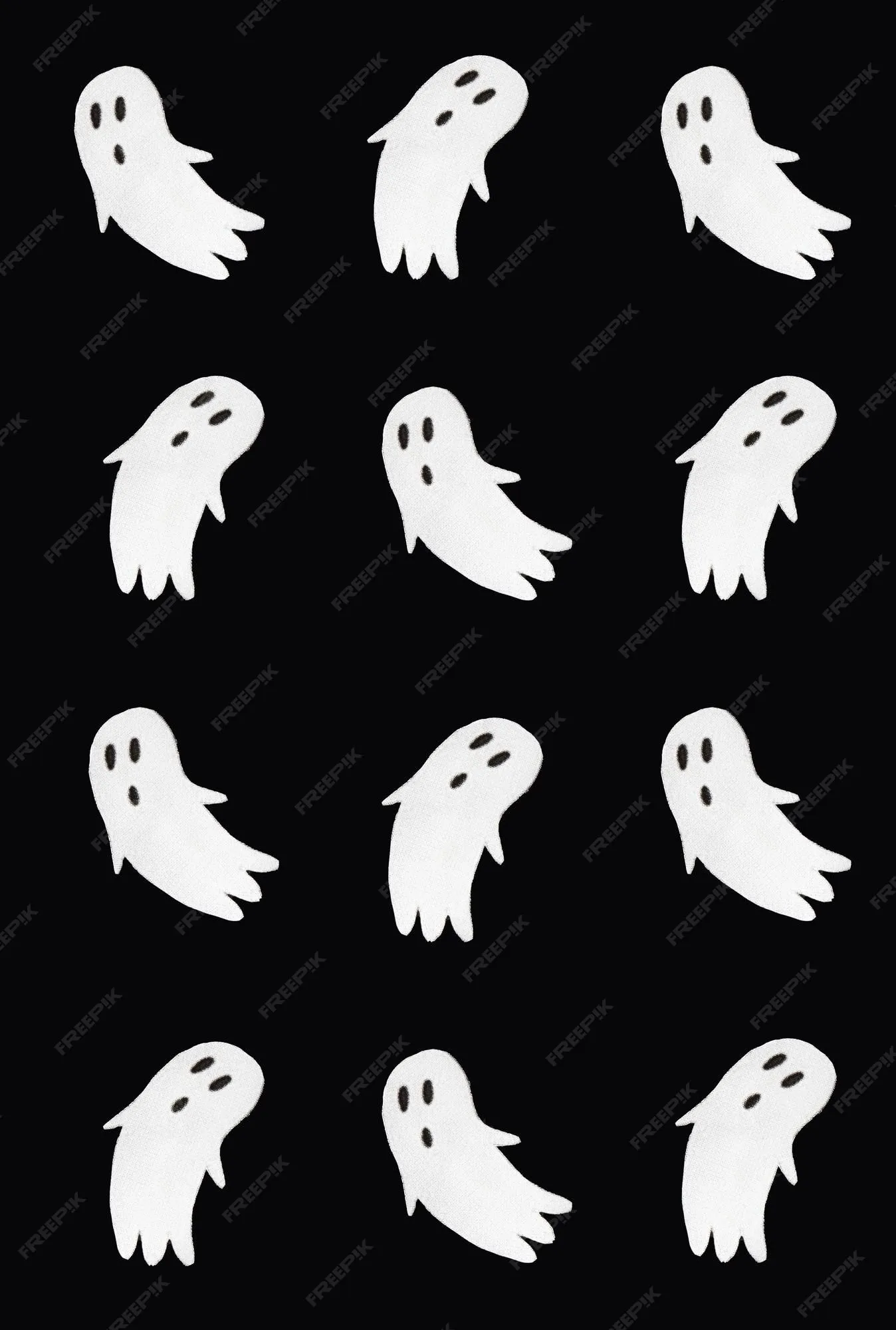 Patrón de terror hecho de fantasmas sobre fondo negro idea espeluznante  concepto de halloween o santa muerte | Foto Premium