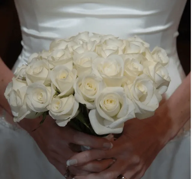 Picture of bridal bouquet with white roses.PNG
