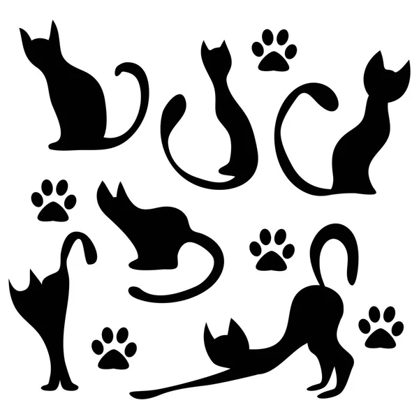 A set of black cat silhouettes — Stock Vector © littlepaw #12059947