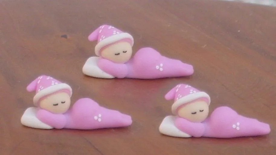 Souvenirs para recien nacidos en porcelana fria NENA - Imagui