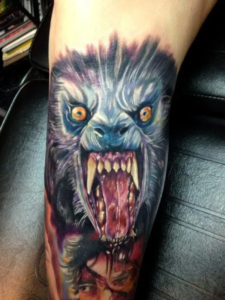 tattoo-arm-realistic-wolf.jpg