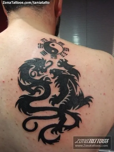 Tatuaje de TANIATATTO - Dragones Yin y Yang Tribales