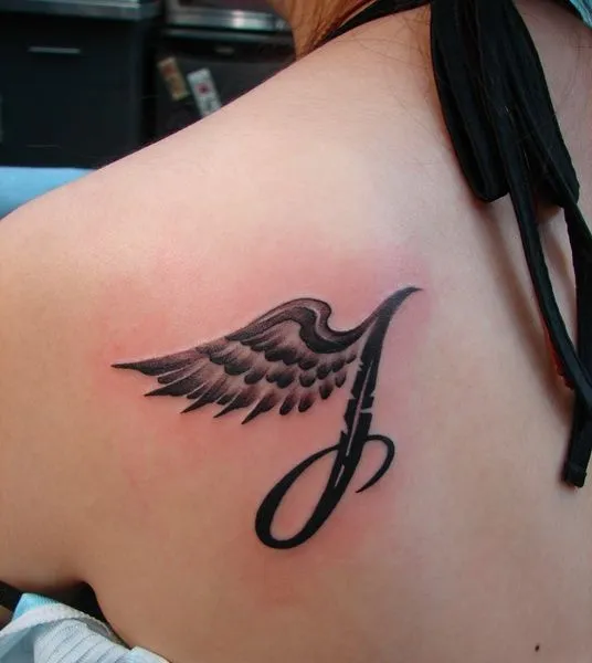 Toronto tattoo shop - Angel wing with letter J tattoo - Click ...