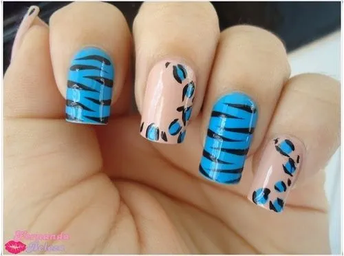 Uñas naranjas y azul de leopardo y cebra. | uñas decoradas | Pinterest