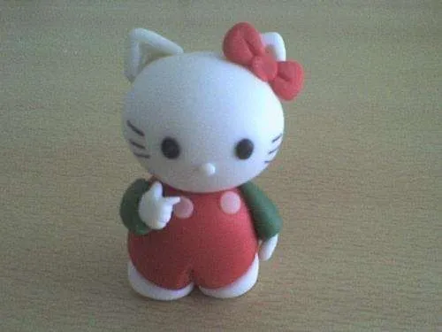 Adornos para tortas y souvenirs en porcelana fria. personajes ... Adornos para tortas y souvenirs en porcelana fria. personajes ...