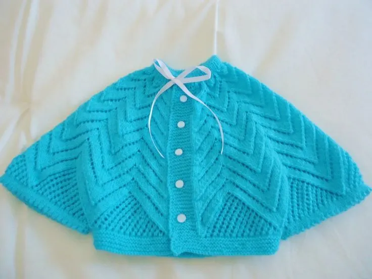 Mañanita turquesa tejida a dos agujas para bebe, primera puesta ... Mañanita turquesa tejida a dos agujas para bebe, primera puesta ...