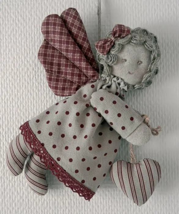 Como hacer un angelito de tela | Solountip. Como hacer un angelito de tela | Solountip.