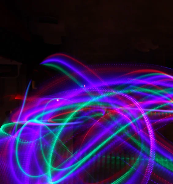 Antecedentes de luces de colores en movimiento — Foto stock ... Antecedentes de luces de colores en movimiento — Foto stock ...