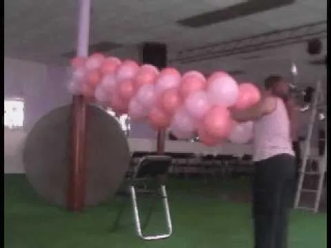 Cómo hacer un arco de globos: 9 pasos (con fotos)