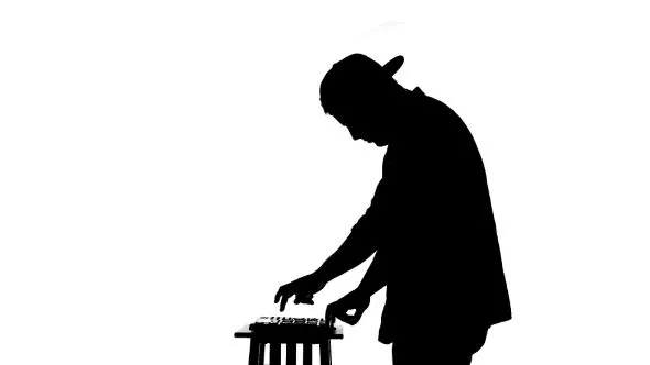 Black Silhouette Of a DJ Playing a Mixer On a - Stock Footage ... Black Silhouette Of a DJ Playing a Mixer On a - Stock Footage ...