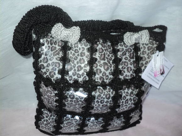Bolsa Patricinha de Onça em pet e crochê | Ariela Mais Crochê | Elo7 Bolsa Patricinha de Onça em pet e crochê | Ariela Mais Crochê | Elo7