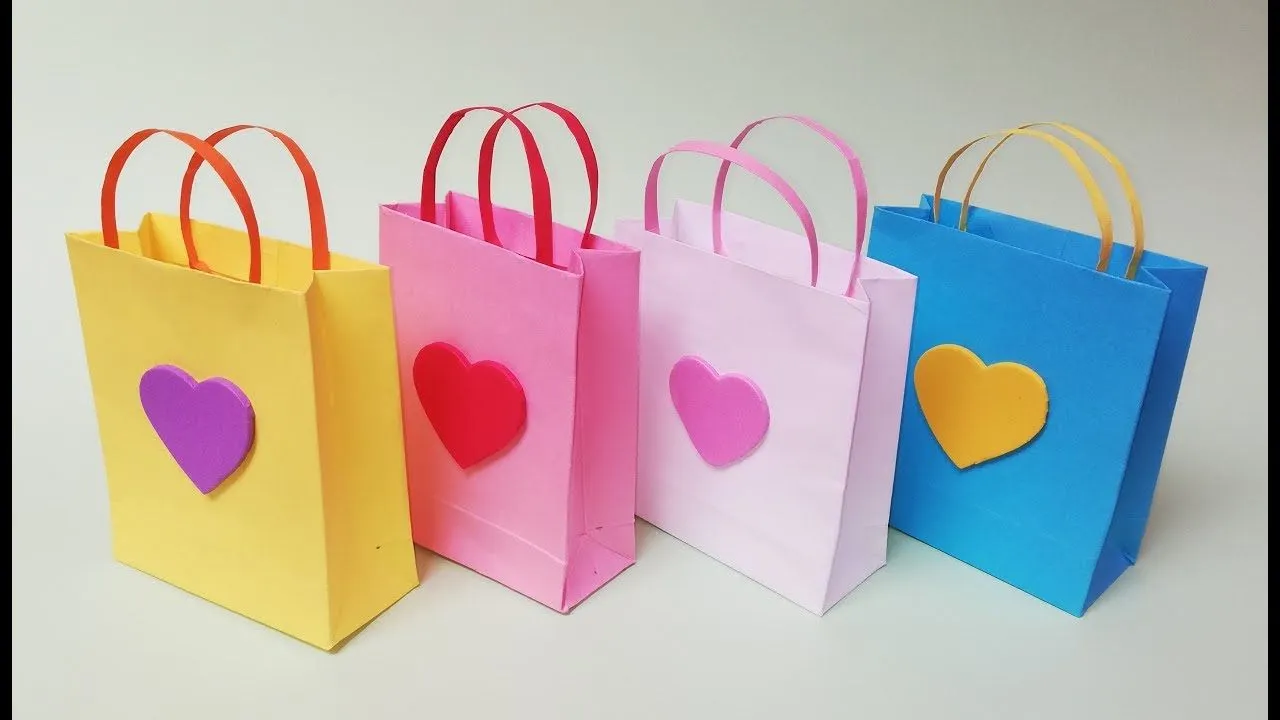 Como hacer bolsas de papel para regalo. Muy facil - YouTube Como hacer bolsas de papel para regalo. Muy facil - YouTube