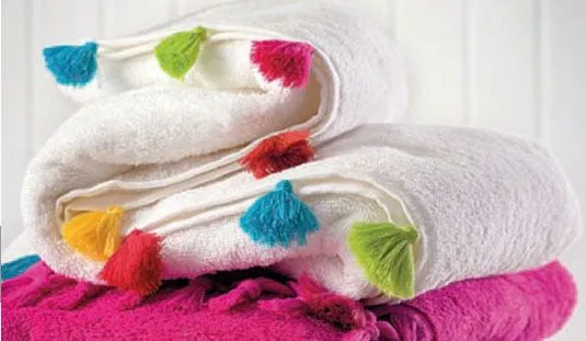 Borlas decorando toallas y sábanas.