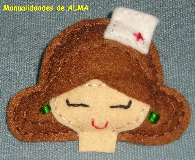 Broches de caras en fieltro - Imagui