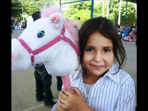 CABALGATA DE LOS CABALLITOS DE PALO DE SAN JUAN BAUTISTA. - YouTube