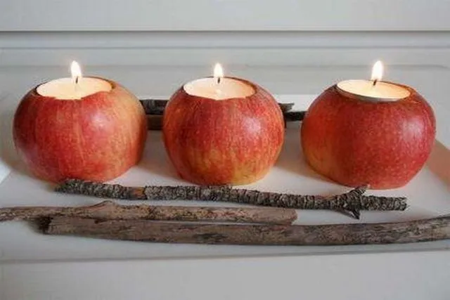 candeleros con manzanas