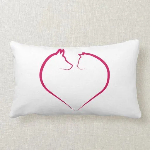 Caras del gato y del perro en silueta roja del cor cojin de Zazzle.