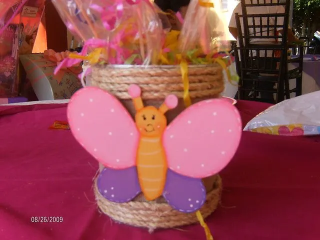 Centros de mesa de mariposas y flores - Imagui