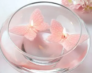 Centros de mesa con velas flotantes para fiestas de 15 | Chica de 15