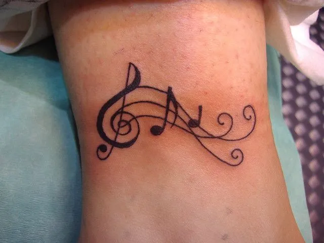 Clave de sol tatuaje - Imagui