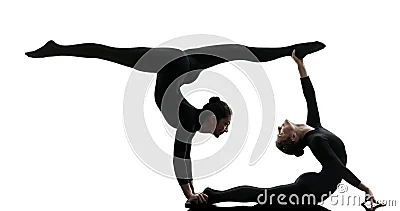Contorsionista de dos mujeres que ejercita la silueta gimnástica de la yoga Contorsionista de dos mujeres que ejercita la silueta gimnástica de la yoga