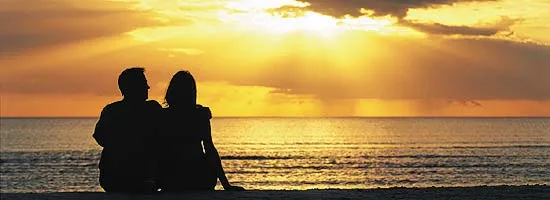 couple-on-beach-at-sunset.jpg