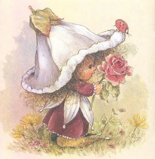 Hada oliendo una flor