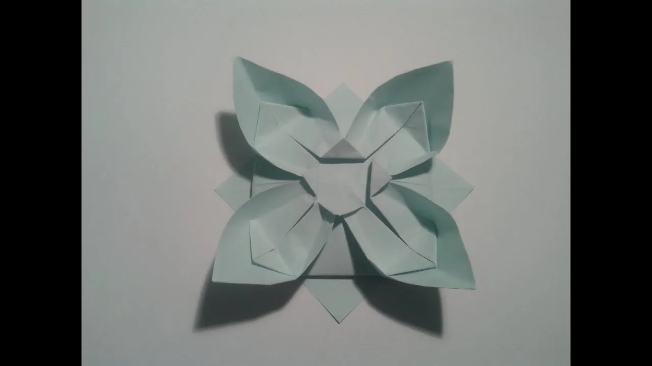 Como hacer una flor de papel sencilla (origami) - YouTube Como hacer una flor de papel sencilla (origami) - YouTube