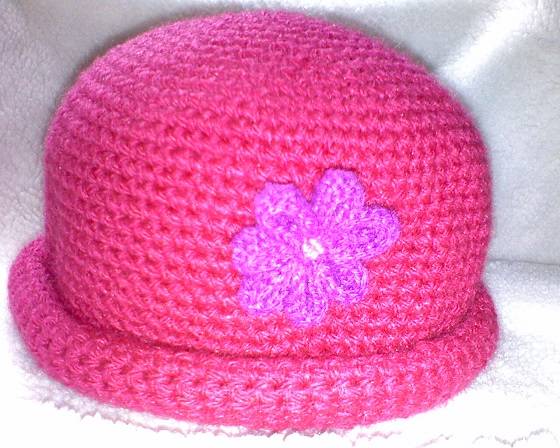 Como hacer flores de ganchillo para gorro - Innatia.com Como hacer flores de ganchillo para gorro - Innatia.com