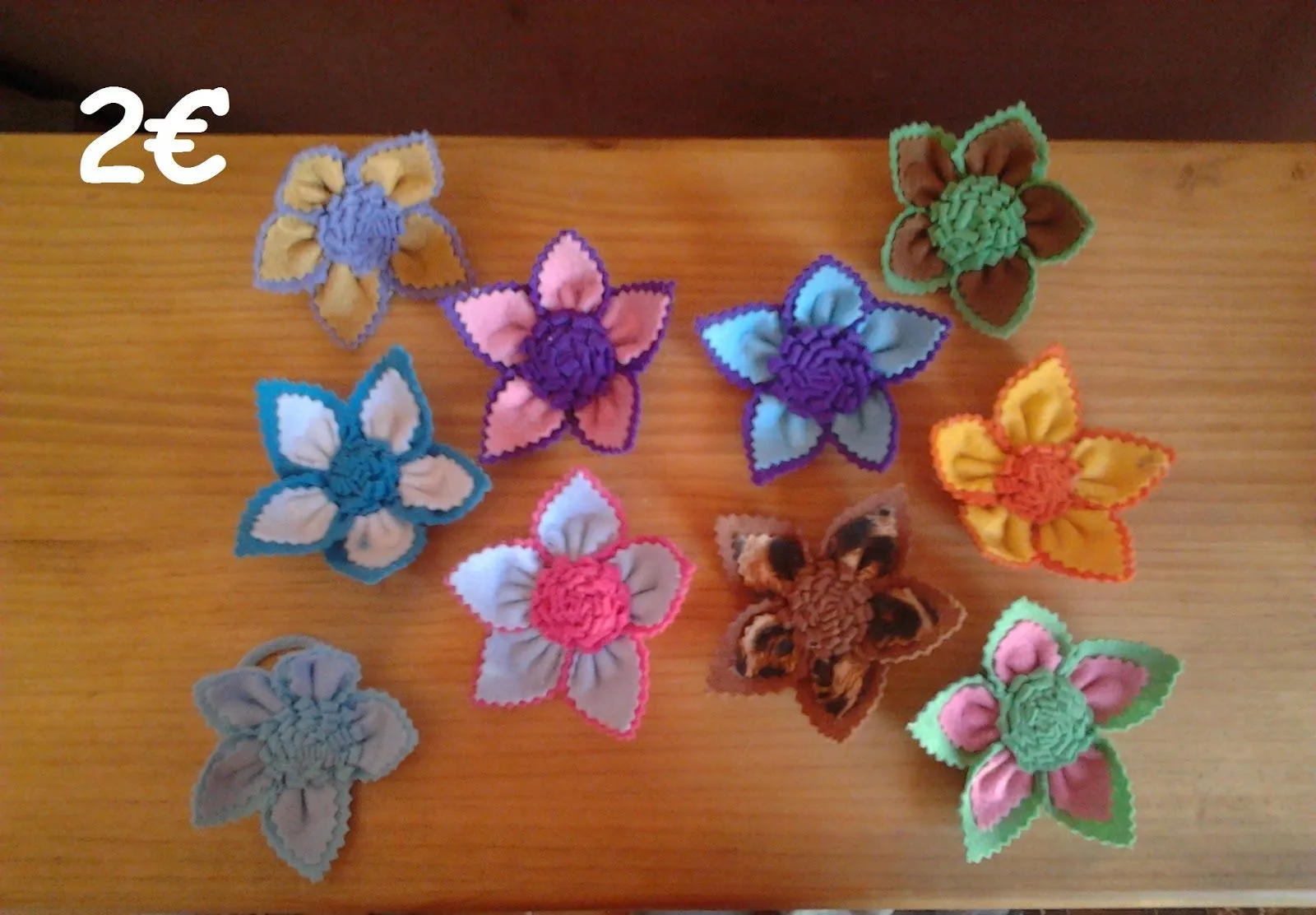 Flores para el pelo en goma eva - Imagui