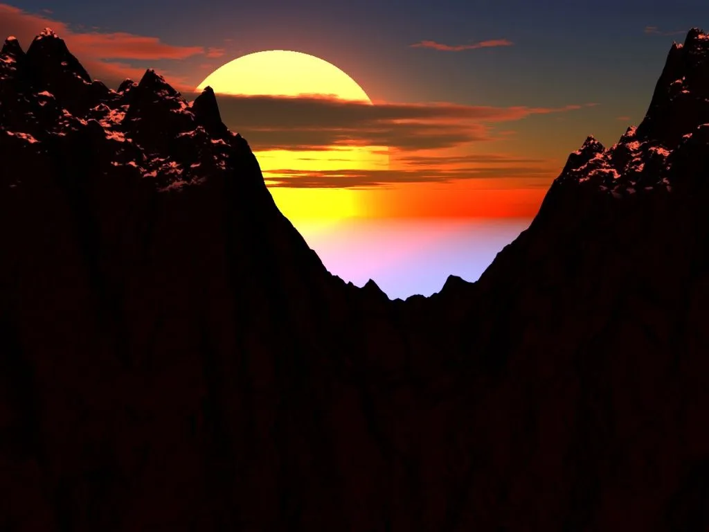 fondo de pantalla donde se ve un hermoso sol escondiendose detras de ...