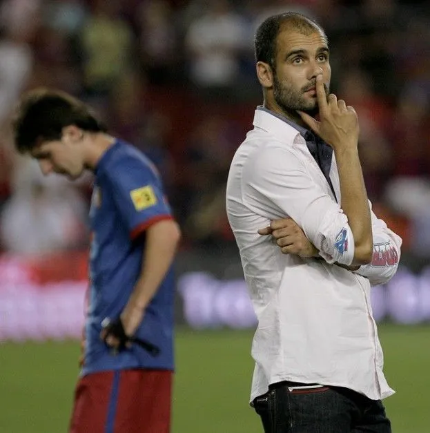 Foto - Guardiola y Messi pensativos