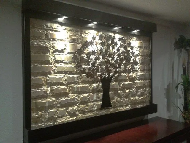 Fuente de pared o muro llorón en acero y mármol amarillo con ... Fuente de pared o muro llorón en acero y mármol amarillo con ...