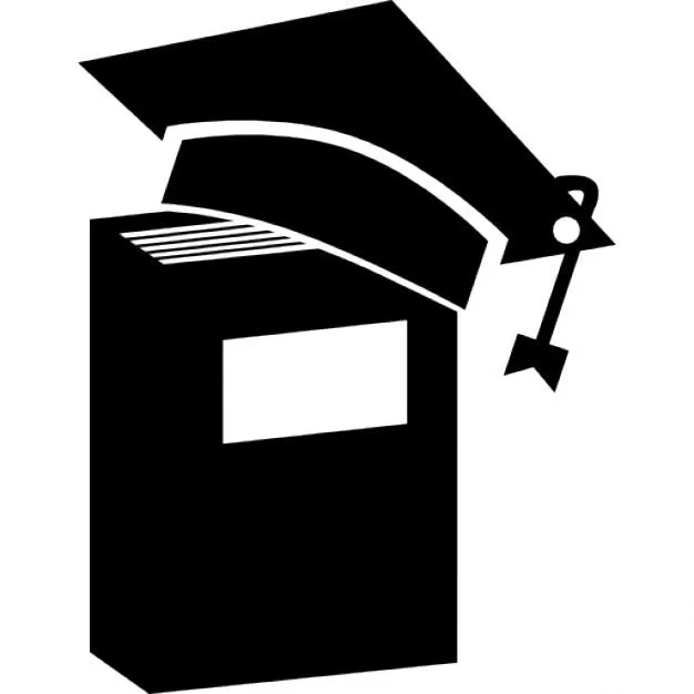 Gorro de graduación en un libro en posición vertical | Descargar ... Gorro de graduación en un libro en posición vertical | Descargar ...