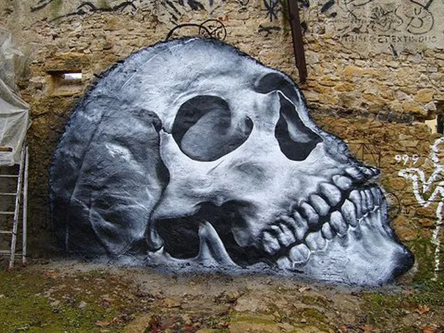 Arte callejero con calaveras - Friki.net