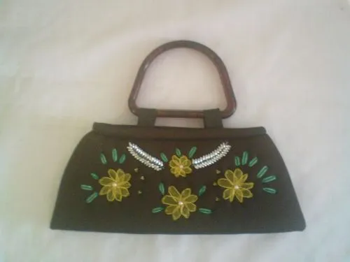 Imagen bolsa de mano, elaborada con liston - grupos.emagister.com
