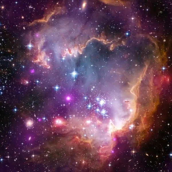 In a Neighboring Galaxy Newborn Stars Shine in Spectral Light ... In a Neighboring Galaxy Newborn Stars Shine in Spectral Light ...
