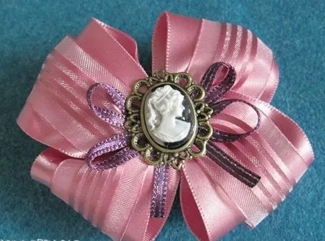 Como hacer lazos para el cabello de cinta y organza ~ Solountip.com Como hacer lazos para el cabello de cinta y organza ~ Solountip.com