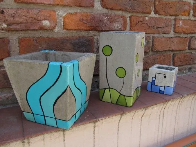 Macetas de cemento pintadas a puro color....con acabado de barniz ...