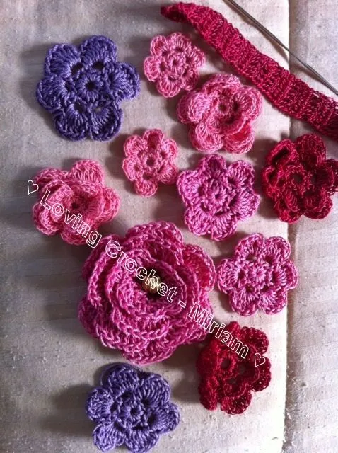 Made a collection of flowers to make jewelry and headband for a ...